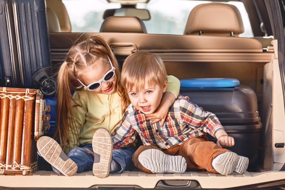 Little kids in the trunk of car with suitcases | Cheap Parking Miami Cruise Port